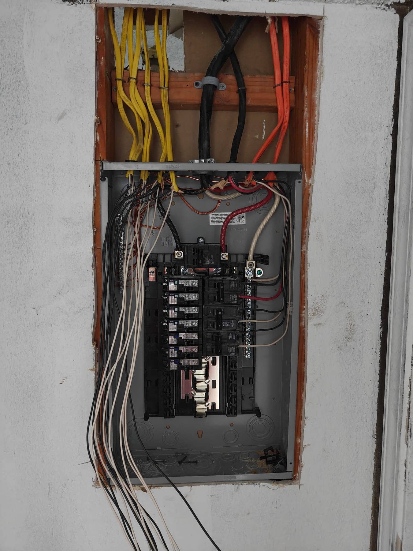 Residential load center with branch-circuit wiring